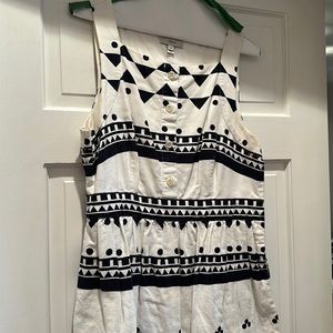 Like new, square neck fit and flare navy and cream dress with pockets.